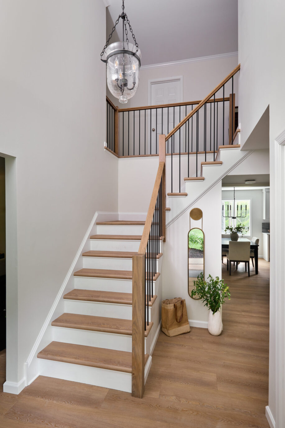 entryway and staircase remodel in Doylestown PA by Restart Design Build. Part of a main floor renovation.